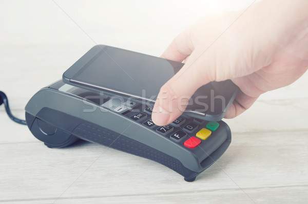 Mobile payment with smart phone Stock photo © simpson33