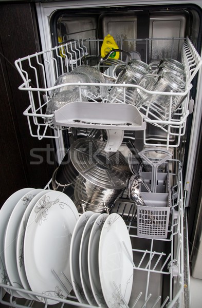 Dishwasher with white plates and glasses Stock photo © simpson33