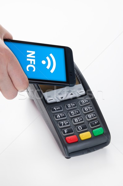 Mobile payment with NFC near field communication technology Stock photo © simpson33