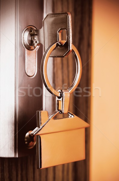 House key with silver chrome pendant Stock photo © simpson33
