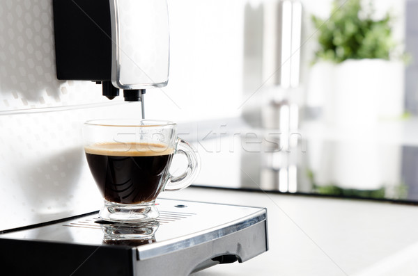 Home professional coffee machine with espresso cup. Stock photo © simpson33
