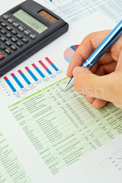 Calculator, pen on a colorful business background Stock photo © simpson33