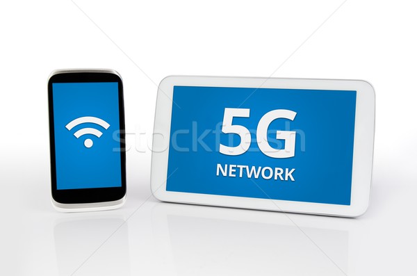 Mobile devices with 5G network standard communication Stock photo © simpson33