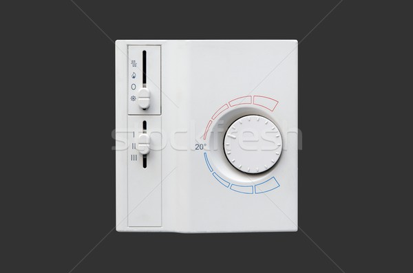 Air conditioner thermostat panel isolated on dark background Stock photo © simpson33