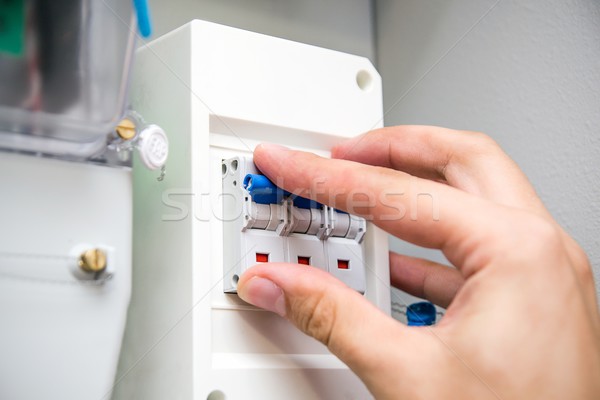 Man switches automatic fuse Stock photo © simpson33