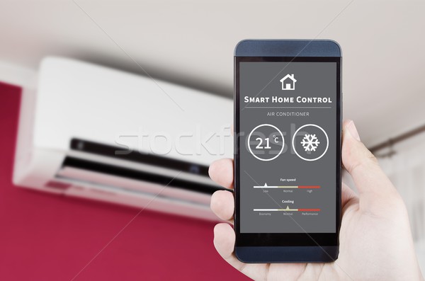 Air conditioner remote control with smart home system. Stock photo © simpson33