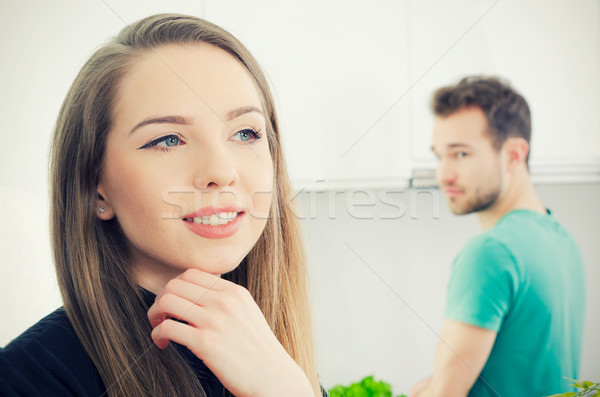 Young couple spends time together in the kitchen Stock photo © simpson33