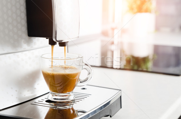 Professional home coffee maker machine making espresso Stock photo © simpson33