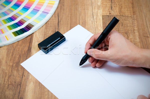 Graphic designer working with modern digitized pen Stock photo © simpson33