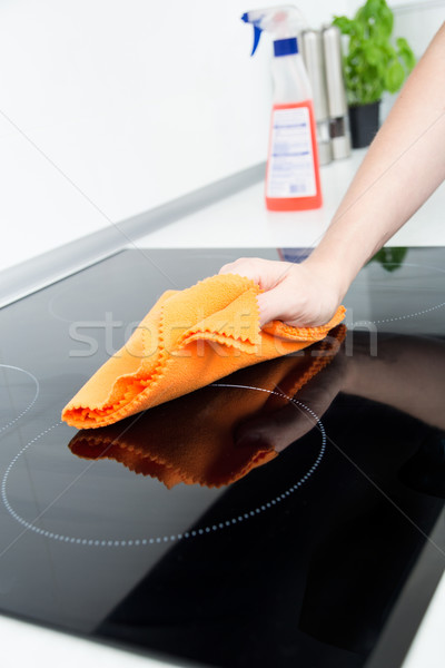 Kéz takarítás tűzhely munka otthon szoba Stock fotó © simpson33