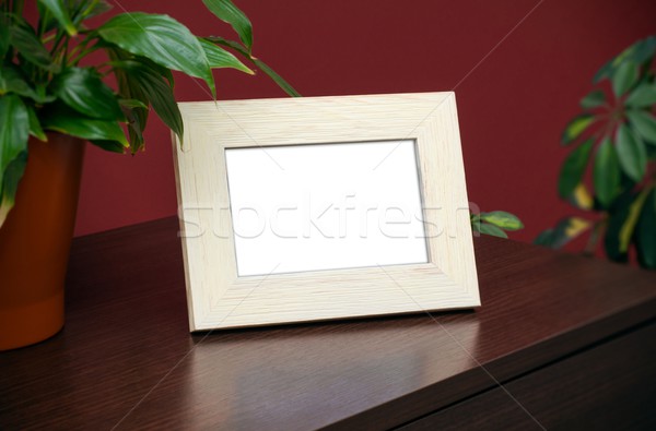 Blank wooden photo frame on the dresser Stock photo © simpson33