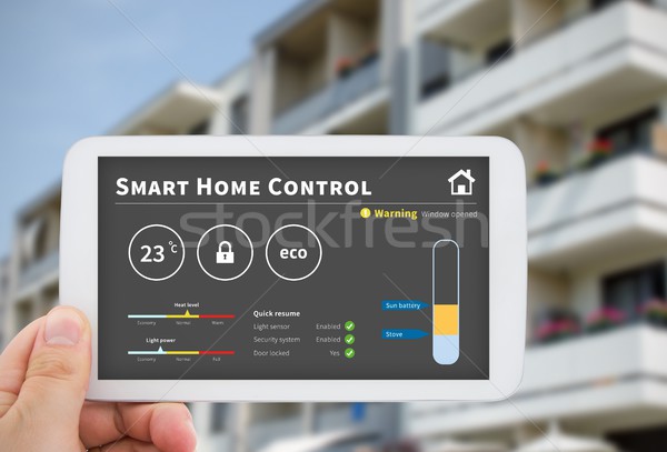 Stock photo: Smart home control technology. Remote automation system on mobil