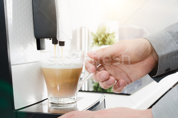 Home professional coffee machine with capuccino cup Stock photo © simpson33