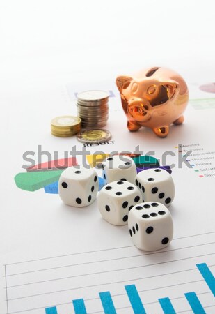 Dices, piggybank, coins stack on business background Stock photo © simpson33