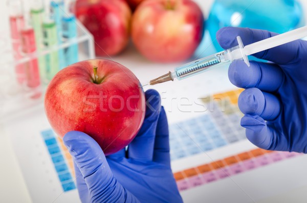 Foto stock: Analista · líquido · manzana · alimentos · laboratorio · mesa