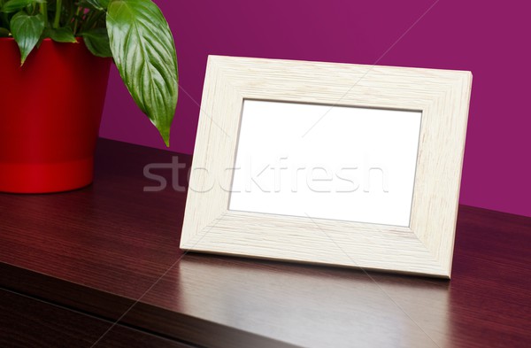 Blank wooden photo frame on the dresser Stock photo © simpson33