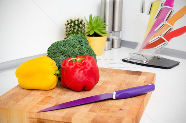 Fresh vegetables on a chopping board in the kitchen Stock photo © simpson33