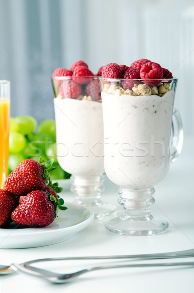 Glass of dessert with fresh berries, muesli and yoghurt Stock photo © simpson33