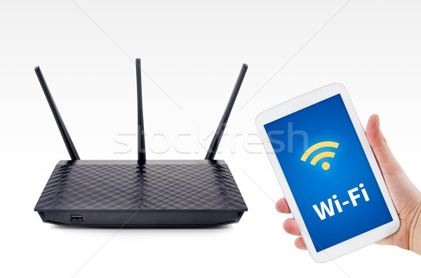Wireless router with mobile device network concept  Stock photo © simpson33