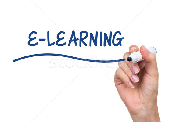 Hand writing e-learning with blue marker on virtual board Stock photo © simpson33