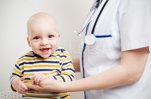 Kicsi aranyos baba orvos család férfi Stock fotó © simpson33