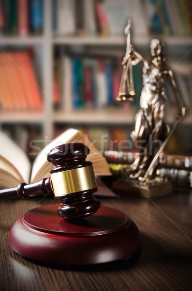 Law concept with gavel and Themis in background Stock photo © simpson33
