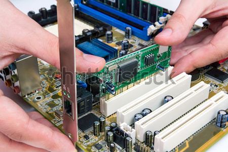 Man installing memory. PC motherboard RAM upgrade Stock photo © simpson33