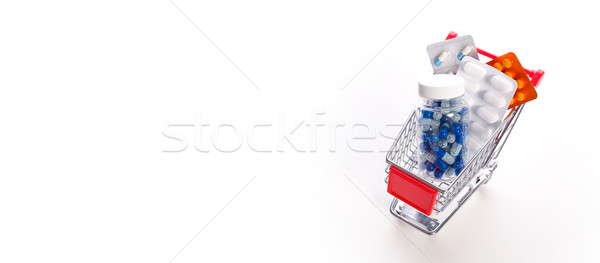 Szett drogok miniatűr bevásárlókocsi tabletták pénz Stock fotó © simpson33
