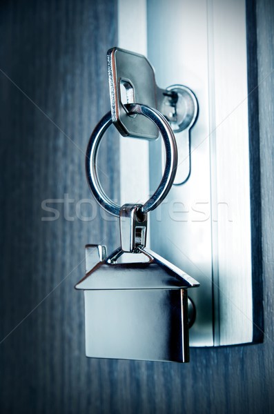 House key with silver chrome pendant Stock photo © simpson33