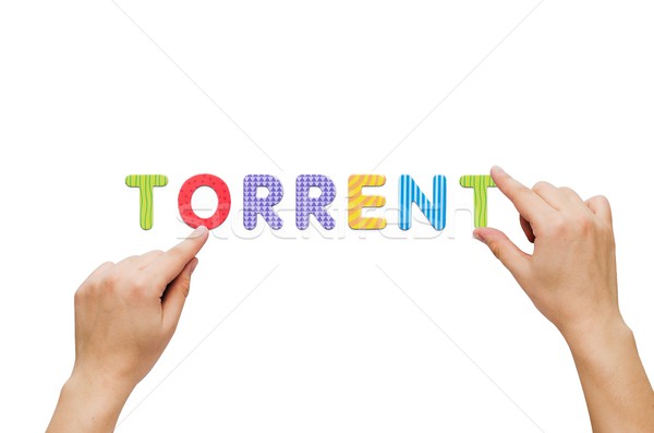 Hand put the word Torrent with magnetic letters Stock photo © simpson33