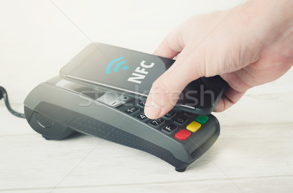 Mobile payment with smart phone Stock photo © simpson33