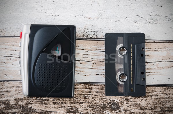 Old tape player, recorder and casette on wooden background Stock photo © simpson33