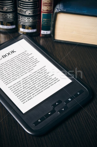 E-book reader device on desk in library Stock photo © simpson33