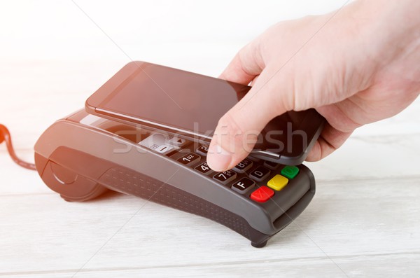 Mobile payment with smart phone Stock photo © simpson33