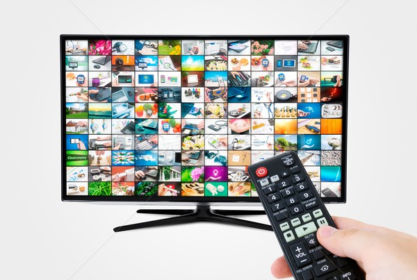 Widescreen high definition TV screen with video gallery. Remote  Stock photo © simpson33