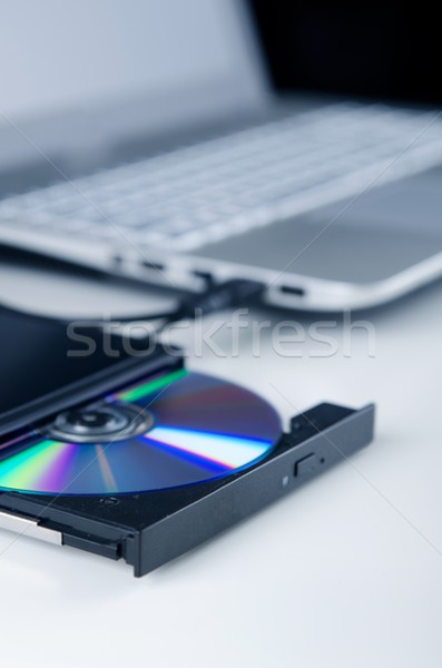 External optical disc writer. Compact device connected via USB p Stock photo © simpson33