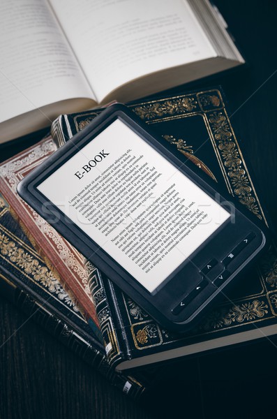 E-book reader device on desk in library Stock photo © simpson33