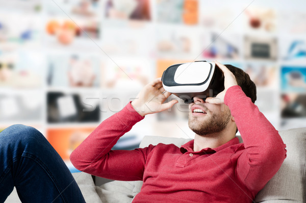 Man wears virtual reality glasses with smartphone inside Stock photo © simpson33