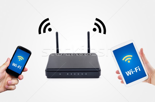 Wireless router with mobile device network concept  Stock photo © simpson33