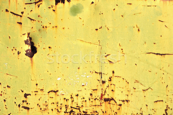 chipped yellow paint on rusty iron Stock photo © sirylok