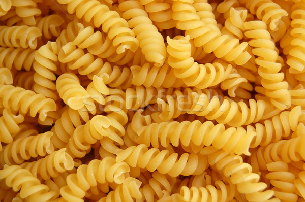 Eliche twirls pasta background Stock photo © sirylok