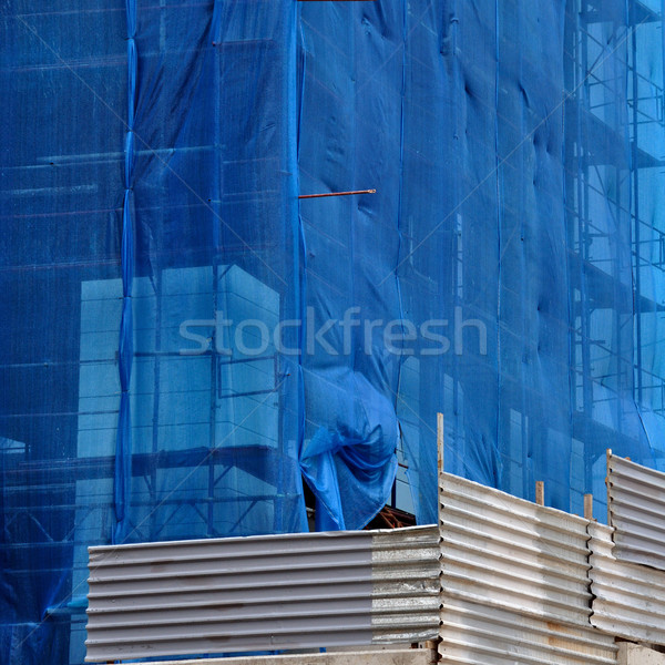 building under debris netting at construction site Stock photo © sirylok