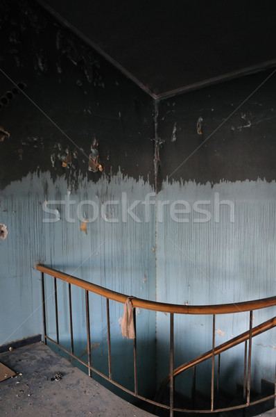stained wall and staircase in abandoned house Stock photo © sirylok