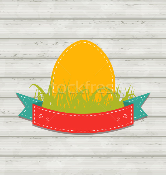 Vintage label with Easter egg on wooden background  Stock photo © smeagorl