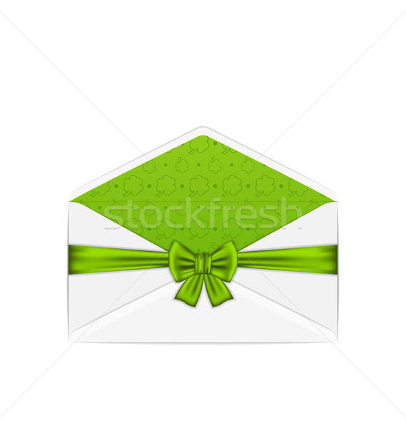 Open white envelope with bow ribbon for St. Patrick's Day, isola Stock photo © smeagorl