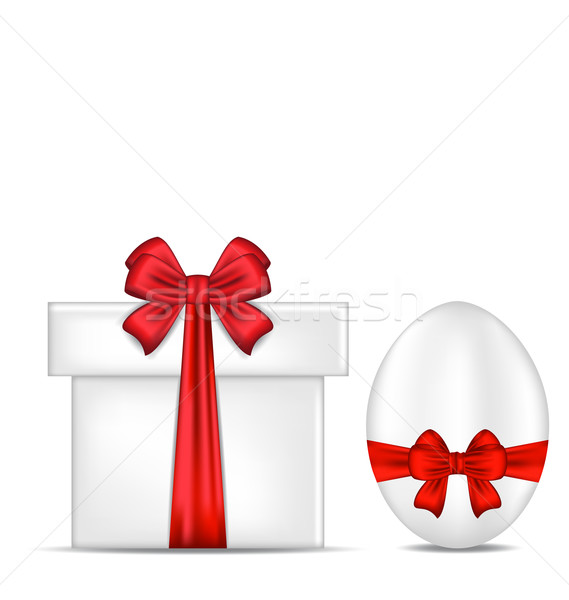 Easter gift box with red bow and egg Stock photo © smeagorl