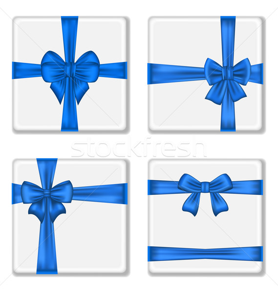 Stock photo: Set gift boxes with blue bows isolated on white background