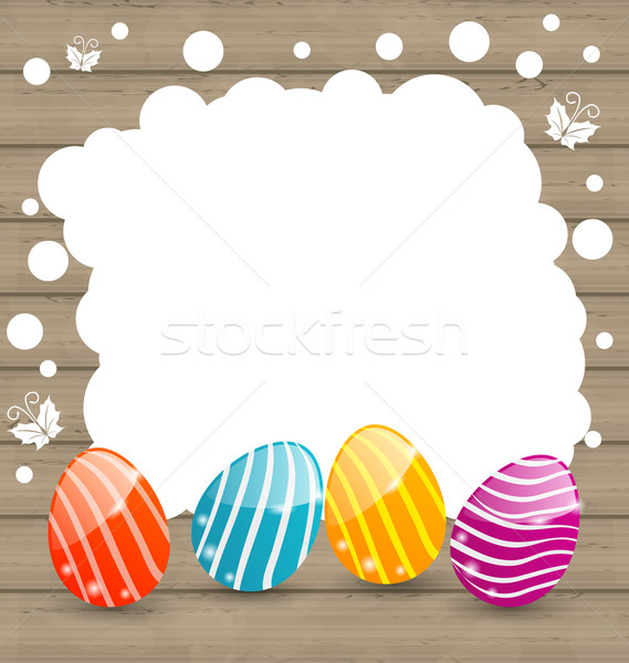 Holiday card with Easter colorful eggs on wooden background Stock photo © smeagorl