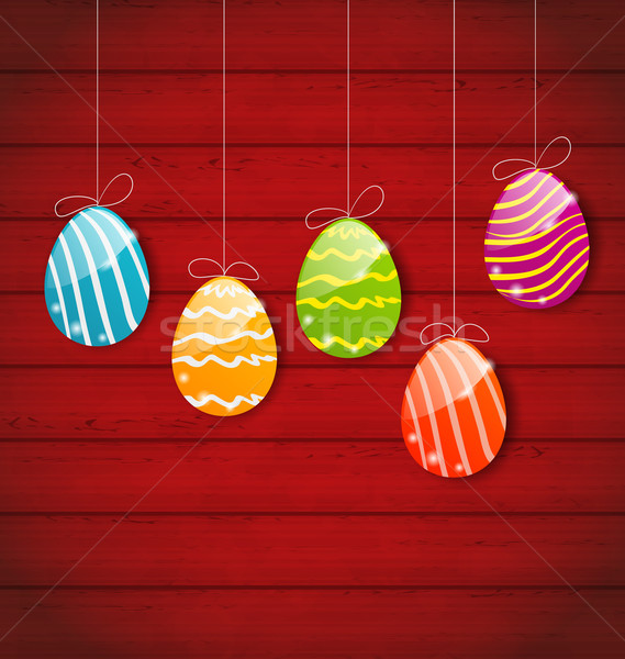 Easter three ornamental colorful eggs on wooden background Stock photo © smeagorl