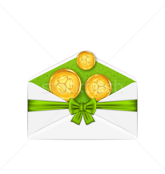 Open white envelope with golden coins and bow ribbon for St. Pat Stock photo © smeagorl